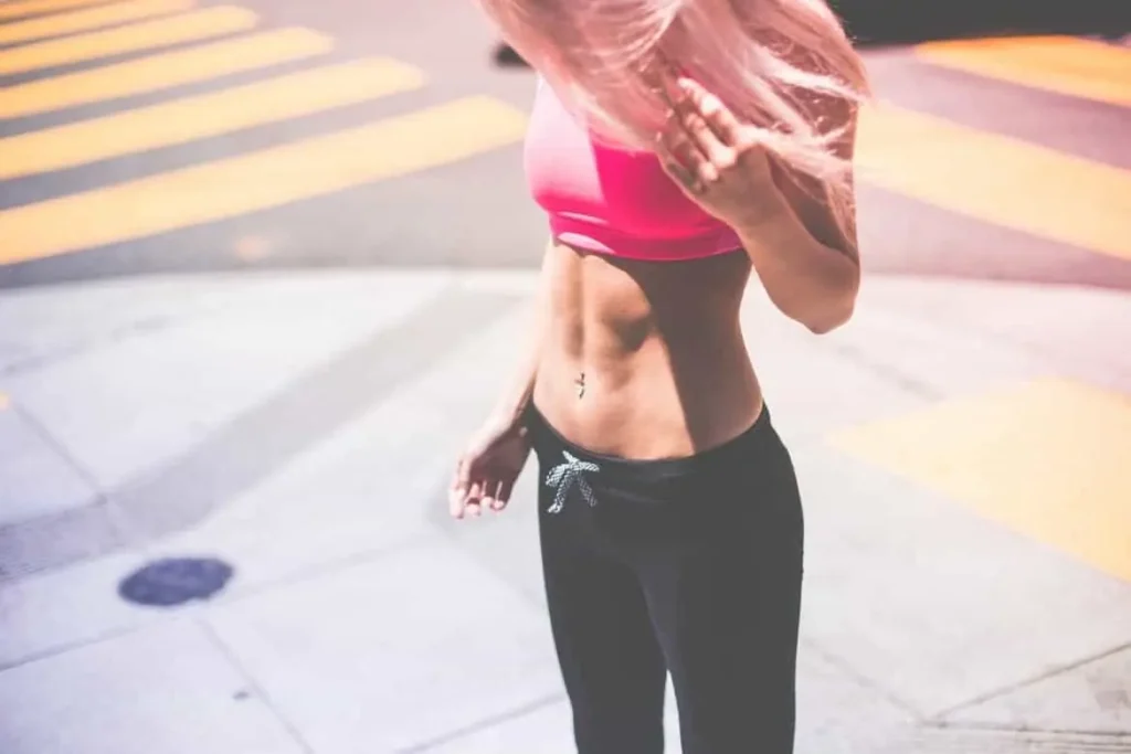 Woman with toned stomach after LA-EMS Body Sculpting Treatment Longbridge